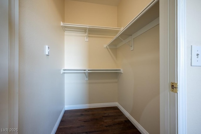 231 W Horizon Ridge Parkway Unit 314, Henderson, NV 89012 - spacious closet featuring dark wood finished floors