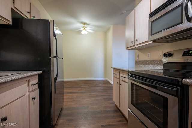 231 W Horizon Ridge Parkway Unit 314, Henderson, NV 89012 - kitchen with stainless steel appliances, a ceiling fan, baseboards, dark wood-type flooring, and light countertops