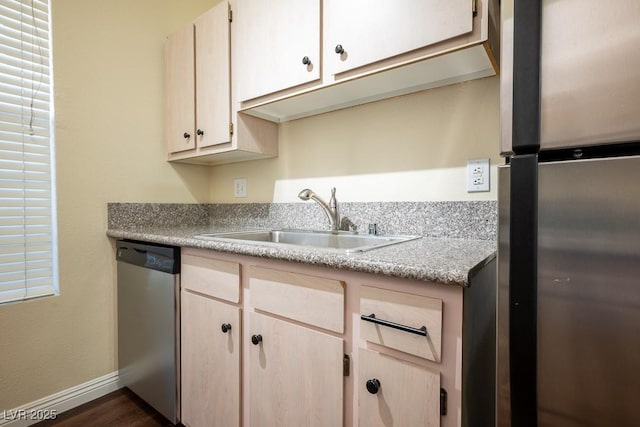 231 W Horizon Ridge Parkway Unit 314, Henderson, NV 89012 - kitchen with appliances with stainless steel finishes, a sink, light countertops, baseboards, and dark wood-style floors