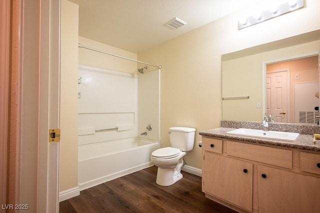 231 W Horizon Ridge Parkway Unit 314, Henderson, NV 89012 - full bathroom featuring vanity, wood finished floors, tub / shower combination, toilet, and baseboards