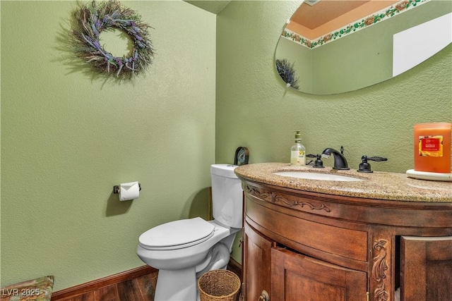 5050 Secret Rock St, Las Vegas, NV 89122 - bathroom featuring wood finished floors and vanity