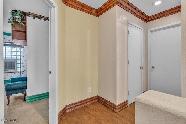 5050 Secret Rock St, Las Vegas, NV 89122 - hallway featuring crown molding and light wood-style floors