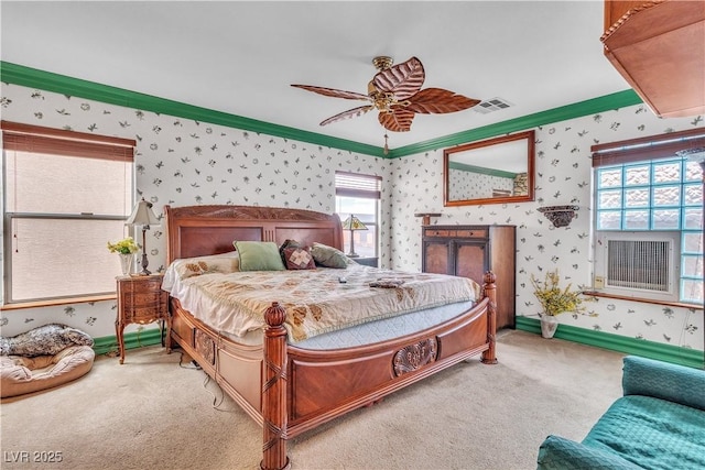5050 Secret Rock St, Las Vegas, NV 89122 - carpeted bedroom featuring wallpapered walls, crown molding, multiple windows, a ceiling fan, and cooling unit