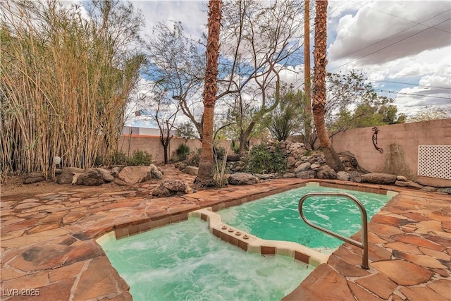 5050 Secret Rock St, Las Vegas, NV 89122 - view of pool featuring an in-ground hot tub