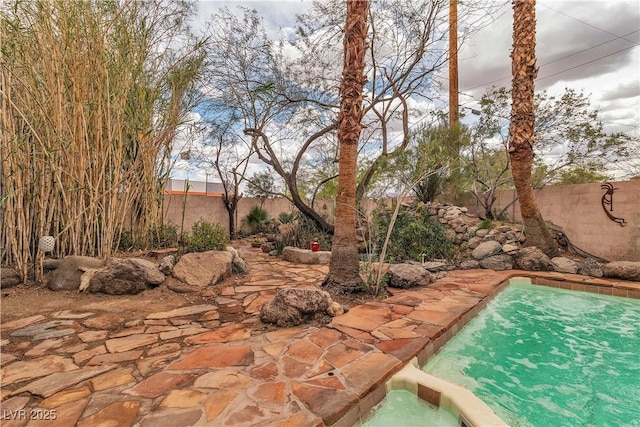 5050 Secret Rock St, Las Vegas, NV 89122 - view of swimming pool with a fenced backyard