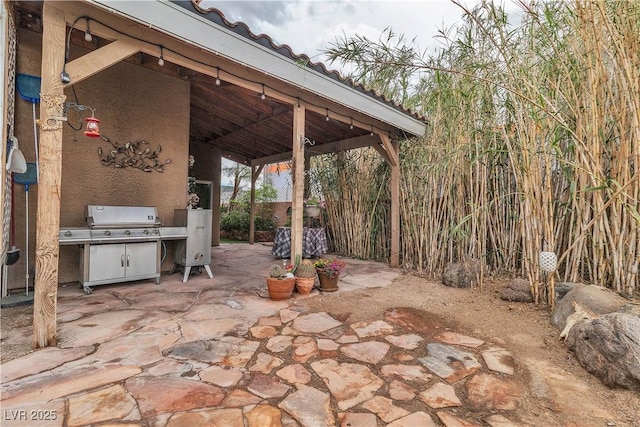 5050 Secret Rock St, Las Vegas, NV 89122 - view of patio featuring a grill