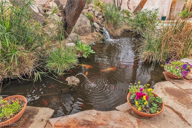 5050 Secret Rock St, Las Vegas, NV 89122 - exterior view of a small pond