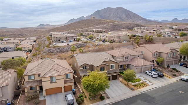 birds eye view of property featuring a residential view and a mountain view