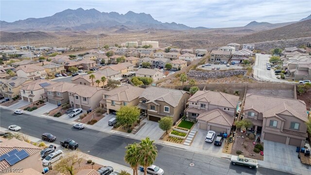 aerial view with a residential view and a mountain view