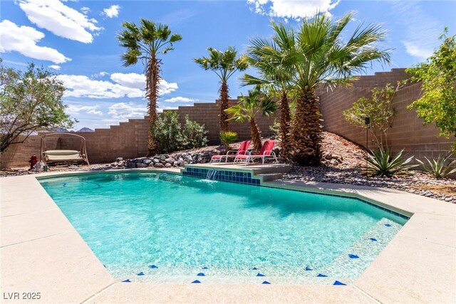 view of swimming pool with a fenced in pool and a fenced backyard
