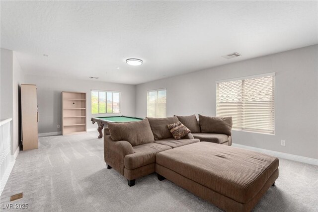 living room with light colored carpet, baseboards, pool table, and visible vents