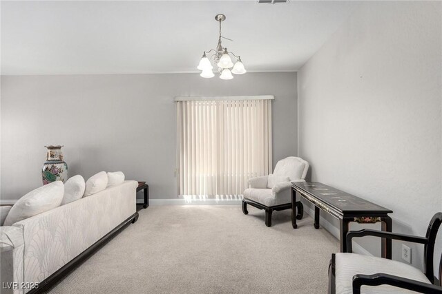 living area with carpet floors, baseboards, a chandelier, and visible vents