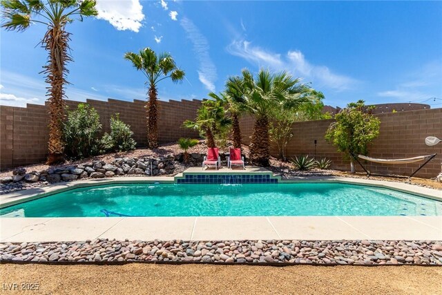 view of swimming pool featuring a fenced in pool and a fenced backyard
