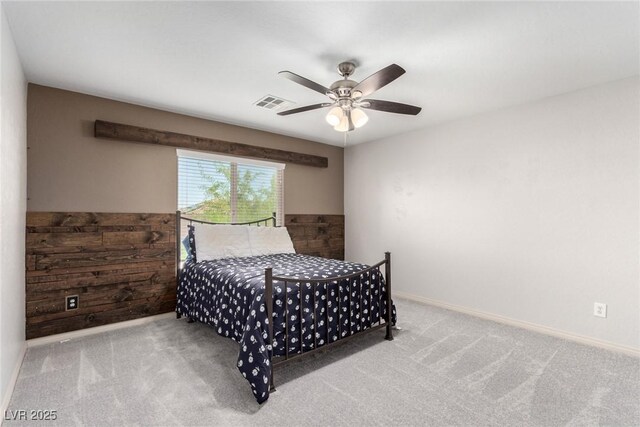 bedroom featuring visible vents, baseboards, and carpet floors