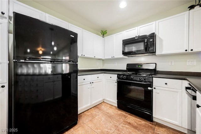 7649 Calico Fields St, Las Vegas, NV 89149 - kitchen with light tile patterned flooring, white cabinets, black appliances, and dark countertops