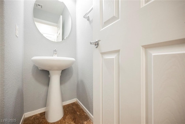 7649 Calico Fields St, Las Vegas, NV 89149 - bathroom with baseboards