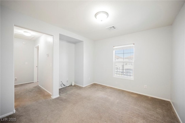 7649 Calico Fields St, Las Vegas, NV 89149 - carpeted spare room with baseboards and visible vents