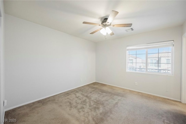 7649 Calico Fields St, Las Vegas, NV 89149 - carpeted empty room featuring baseboards, visible vents, and ceiling fan