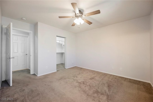 7649 Calico Fields St, Las Vegas, NV 89149 - unfurnished bedroom with a closet, carpet, baseboards, ceiling fan, and a spacious closet