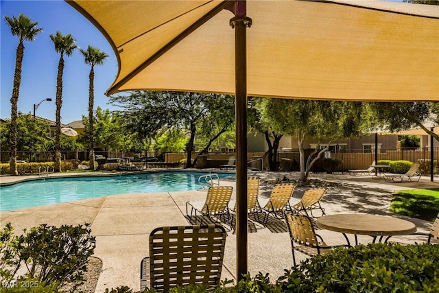 7649 Calico Fields St, Las Vegas, NV 89149 - pool with fence and a patio