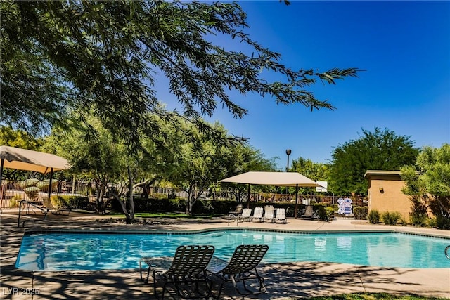 7649 Calico Fields St, Las Vegas, NV 89149 - pool featuring fence and a patio