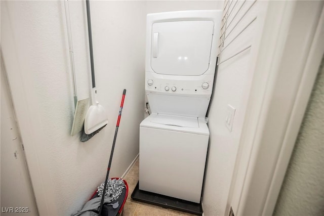 7649 Calico Fields St, Las Vegas, NV 89149 - laundry area with laundry area, stacked washing maching and dryer, and tile patterned floors