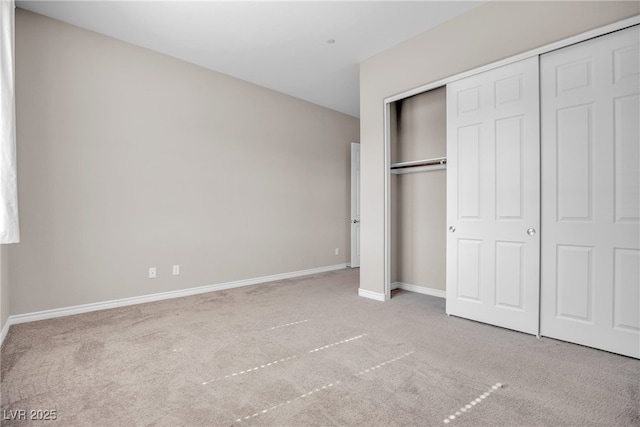 665 Look Lively Ct, Henderson, NV 89011 - unfurnished bedroom featuring carpet, baseboards, and a closet