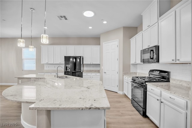 665 Look Lively Ct, Henderson, NV 89011 - kitchen featuring black appliances, a sink, baseboards, decorative backsplash, and recessed lighting