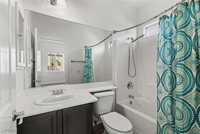 full bath featuring toilet, shower / bath combo, and vanity