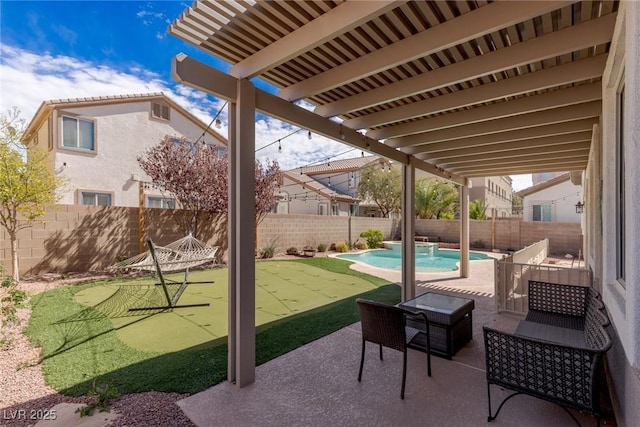 view of patio / terrace with a fenced in pool and a fenced backyard