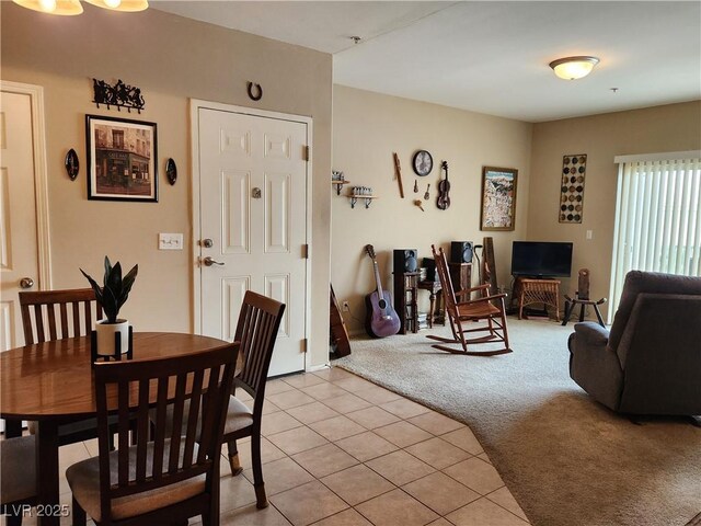 3550 Bay Sands Dr Unit 3077, Laughlin, NV 89029 - dining area featuring light tile patterned floors and light colored carpet