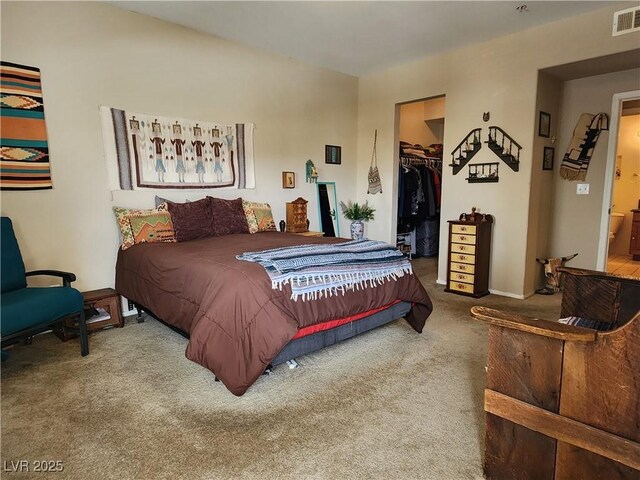 3550 Bay Sands Dr Unit 3077, Laughlin, NV 89029 - bedroom with a walk in closet, carpet, a closet, and visible vents