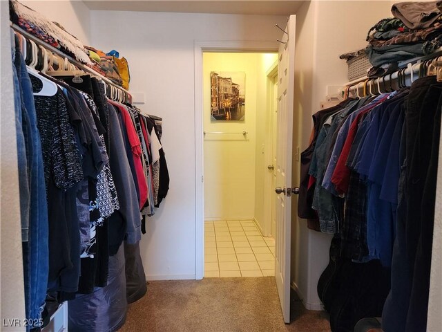 3550 Bay Sands Dr Unit 3077, Laughlin, NV 89029 - spacious closet with tile patterned floors and carpet