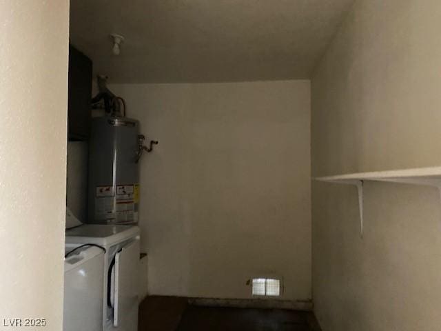 7732 Blackbird Ave, Las Vegas, NV 89145 - laundry area with washing machine and dryer and gas water heater