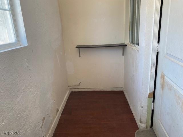 7732 Blackbird Ave, Las Vegas, NV 89145 - unfurnished room featuring wood finished floors and baseboards