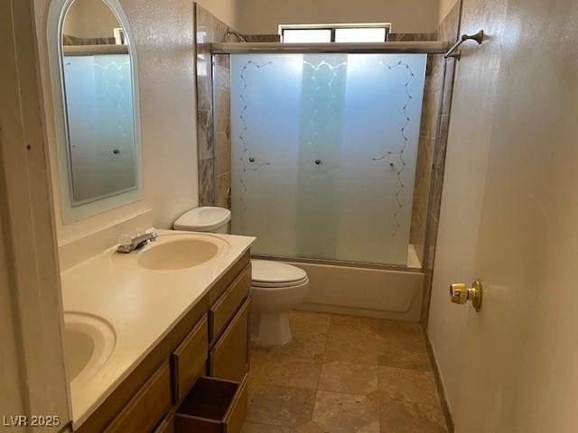 7732 Blackbird Ave, Las Vegas, NV 89145 - bathroom with double vanity and combined bath / shower with glass door