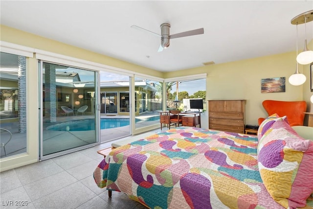 3586 Spencer St, Las Vegas, NV 89169 - bedroom with tile patterned floors, visible vents, a ceiling fan, and access to outside