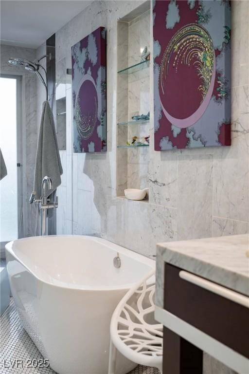 3586 Spencer St, Las Vegas, NV 89169 - full bath with tile walls, a freestanding bath, and vanity