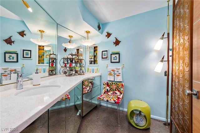 3586 Spencer St, Las Vegas, NV 89169 - bathroom with vanity and baseboards