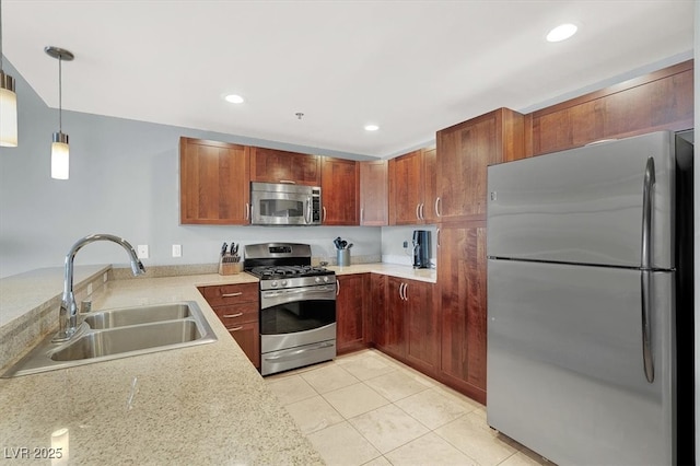 150 Las Vegas Blvd Unit 918, Las Vegas, NV 89101 - kitchen featuring stainless steel appliances, a sink, decorative light fixtures, light tile patterned flooring, and recessed lighting