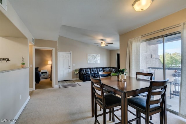 8000 Badura Ave Unit 2063, Las Vegas, NV 89113 - dining space with a ceiling fan, light colored carpet, baseboards, and lofted ceiling