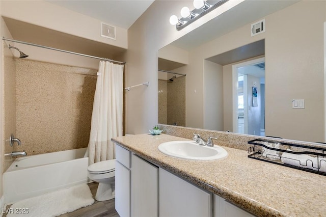 8000 Badura Ave Unit 2063, Las Vegas, NV 89113 - full bath featuring shower / bath combination with curtain, toilet, vanity, and wood finished floors