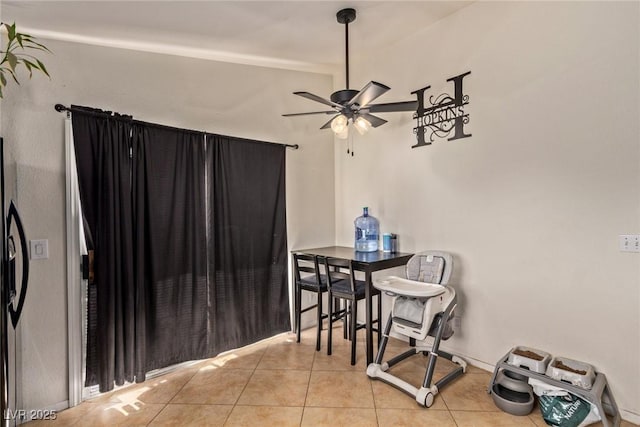 dining area featuring light tile patterned flooring and ceiling fan