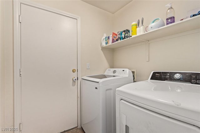 laundry area featuring laundry area and washer and clothes dryer