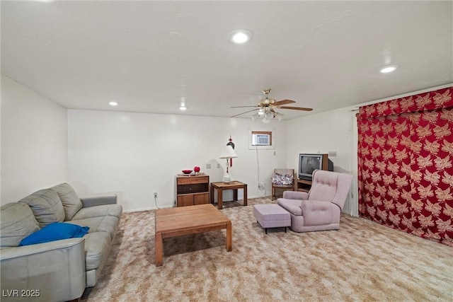 living room featuring carpet, recessed lighting, and a ceiling fan