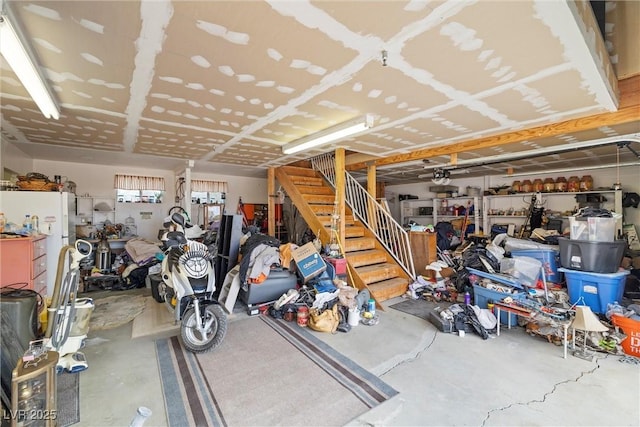 garage with freestanding refrigerator