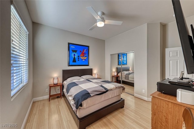 2064 Poetry Ave, Henderson, NV 89052 - bedroom featuring baseboards, light wood-style flooring, and a ceiling fan