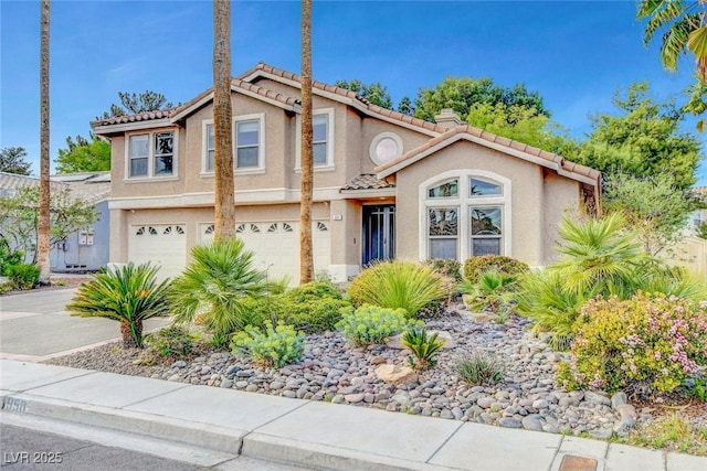 950 Eagle Mountain Dr, Las Vegas, NV 89123 - view of front facade with a garage, stucco siding, a tiled roof, and driveway
