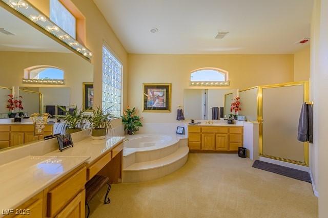 10524 Longwood Dr, Las Vegas, NV 89134 - bathroom with a shower stall, visible vents, vanity, and a bath