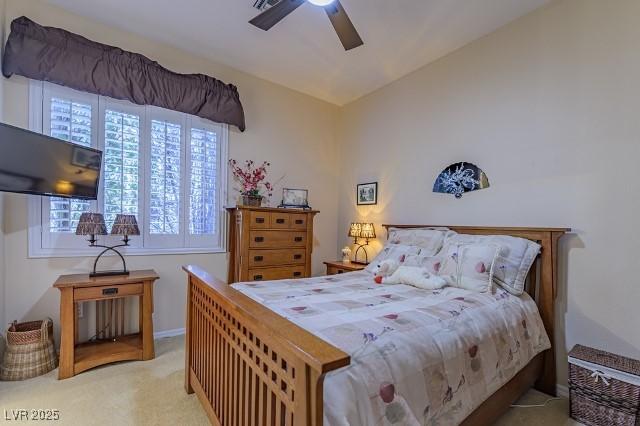 10524 Longwood Dr, Las Vegas, NV 89134 - bedroom with lofted ceiling, carpet floors, and a ceiling fan